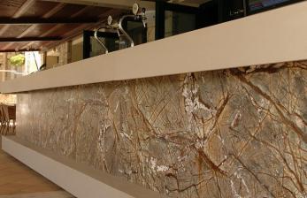 Bar facade with Rainforest Brown marble