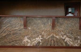Bar facade with Rainforest Brown marble